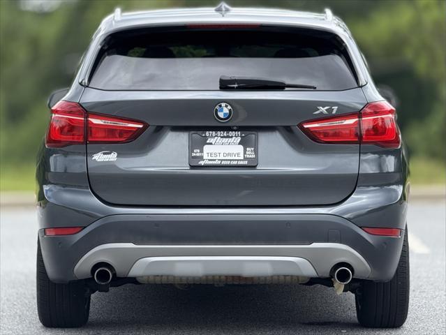 used 2016 BMW X1 car, priced at $11,949