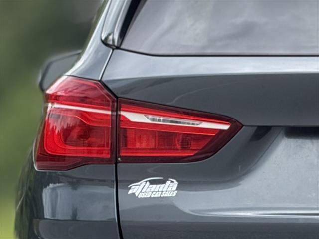used 2016 BMW X1 car, priced at $11,949