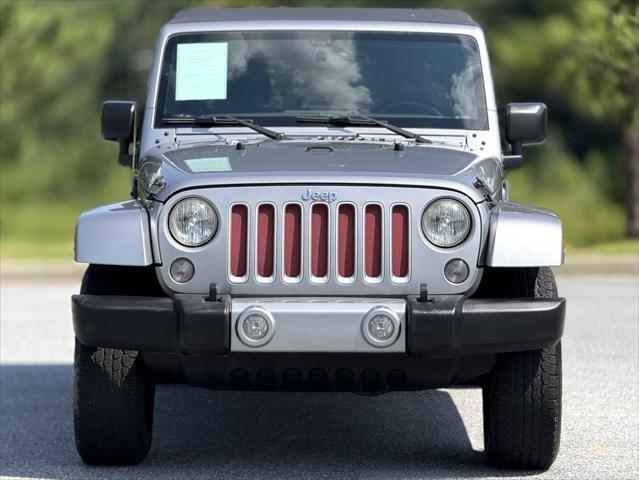 used 2016 Jeep Wrangler Unlimited car, priced at $18,759