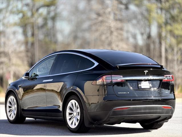 used 2018 Tesla Model X car, priced at $31,389