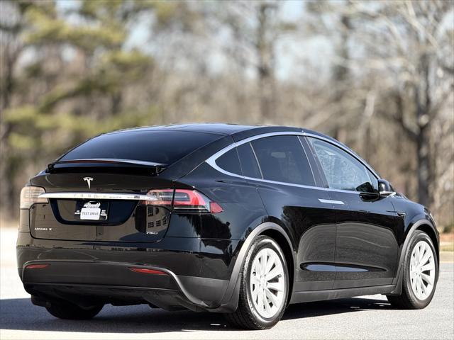 used 2018 Tesla Model X car, priced at $31,389