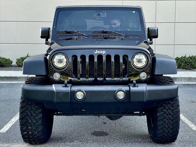 used 2017 Jeep Wrangler Unlimited car, priced at $27,089