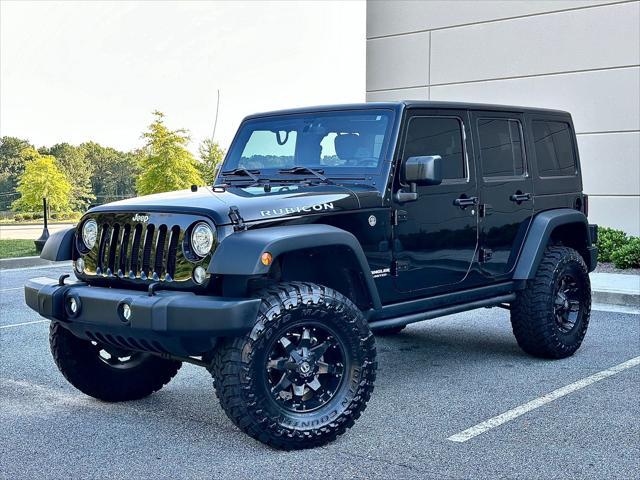 used 2017 Jeep Wrangler Unlimited car, priced at $27,089