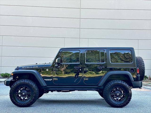 used 2017 Jeep Wrangler Unlimited car, priced at $27,089