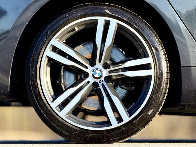 used 2017 BMW 750 car, priced at $21,289