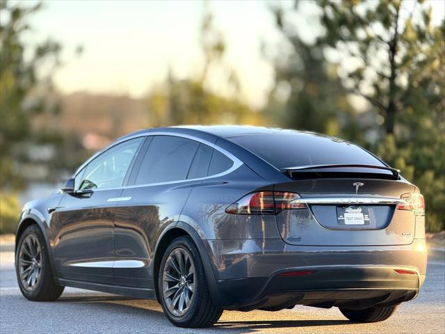 used 2018 Tesla Model X car, priced at $28,999