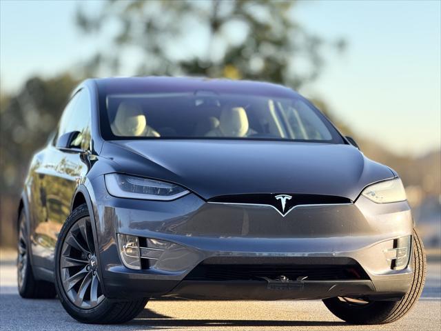 used 2018 Tesla Model X car, priced at $28,999