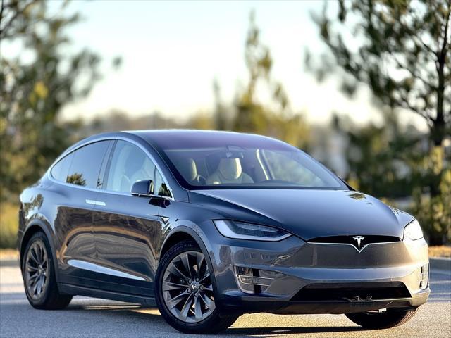 used 2018 Tesla Model X car, priced at $28,999