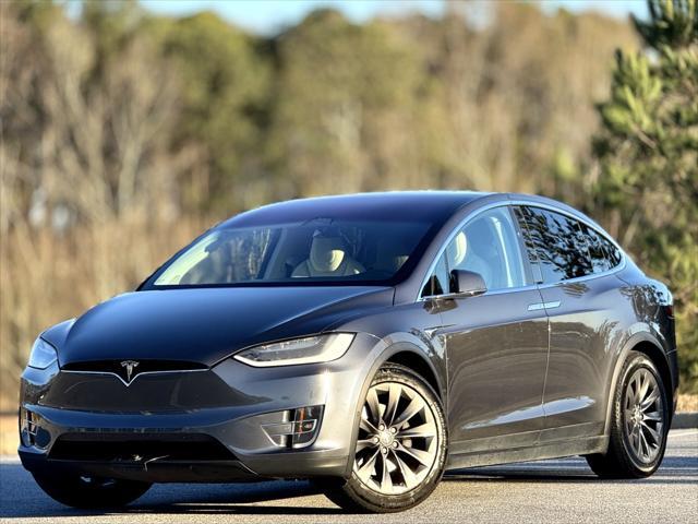 used 2018 Tesla Model X car, priced at $28,999