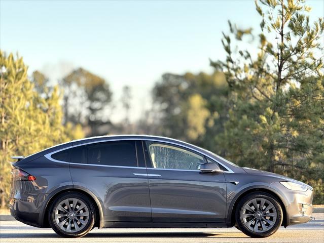 used 2018 Tesla Model X car, priced at $28,999