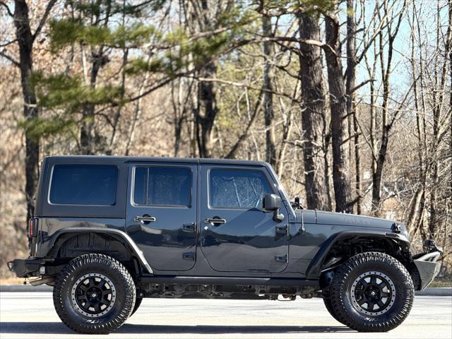 used 2018 Jeep Wrangler JK Unlimited car, priced at $20,999