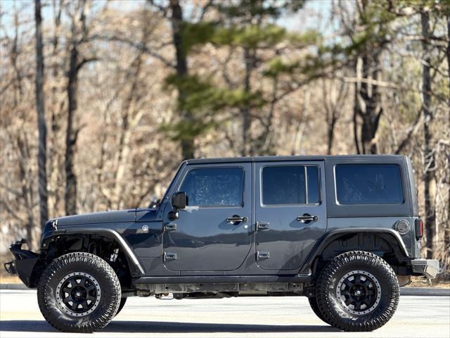 used 2018 Jeep Wrangler JK Unlimited car, priced at $20,999