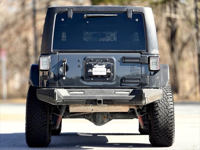 used 2018 Jeep Wrangler JK Unlimited car, priced at $20,999