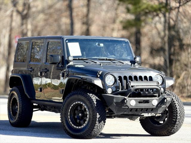 used 2018 Jeep Wrangler JK Unlimited car, priced at $20,999