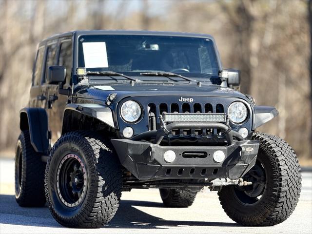 used 2018 Jeep Wrangler JK Unlimited car, priced at $20,999