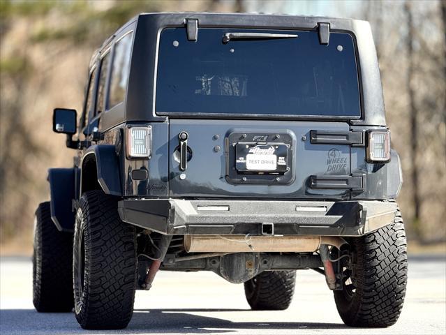 used 2018 Jeep Wrangler JK Unlimited car, priced at $20,999