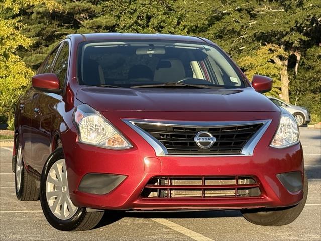 used 2016 Nissan Versa car, priced at $5,999