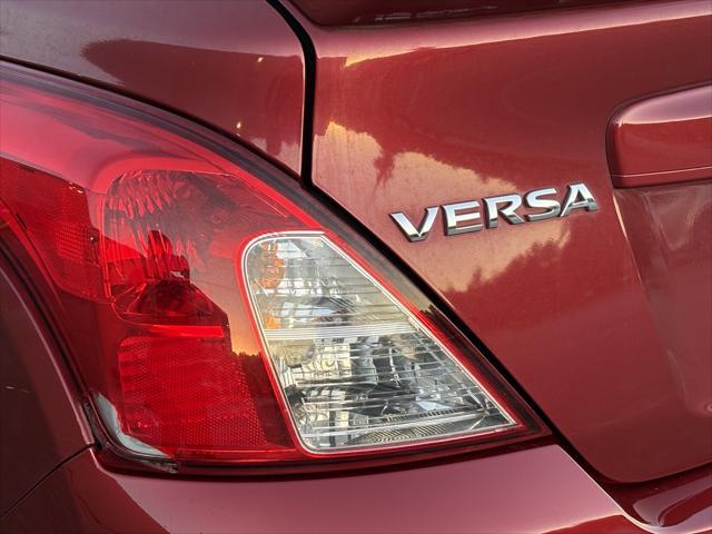 used 2016 Nissan Versa car, priced at $5,999