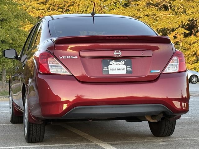 used 2016 Nissan Versa car, priced at $5,999