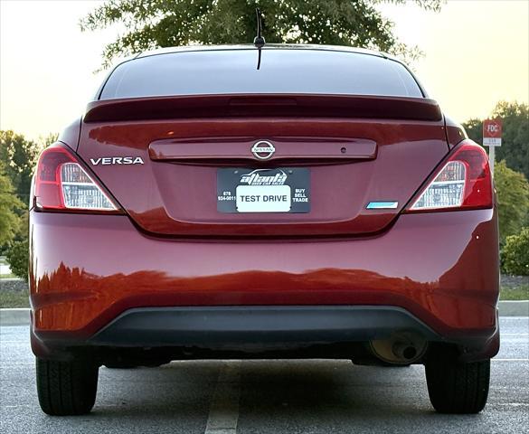 used 2016 Nissan Versa car, priced at $5,999