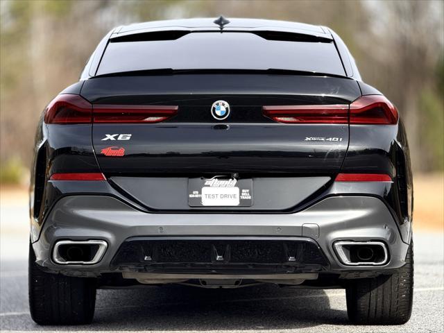 used 2022 BMW X6 car, priced at $46,899