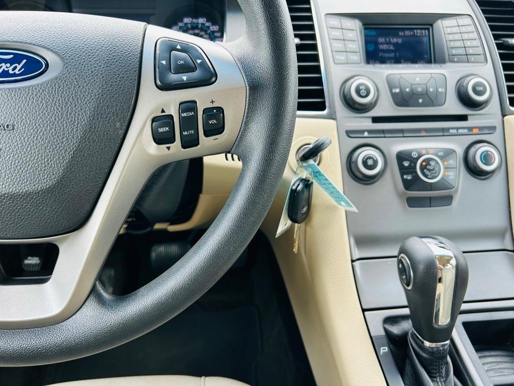 used 2014 Ford Taurus car, priced at $10,000