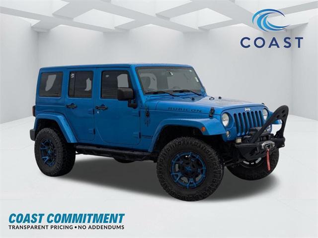 used 2015 Jeep Wrangler Unlimited car, priced at $21,391