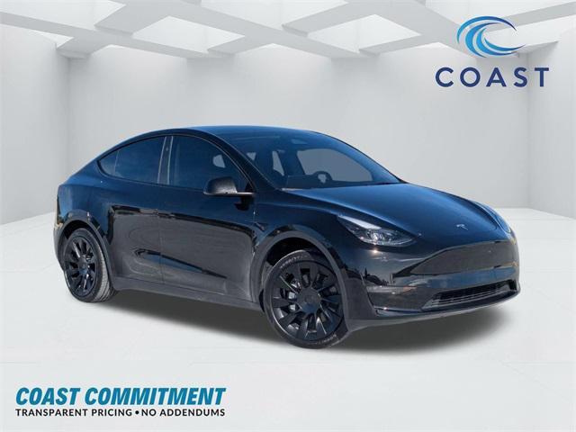 used 2024 Tesla Model Y car, priced at $35,999