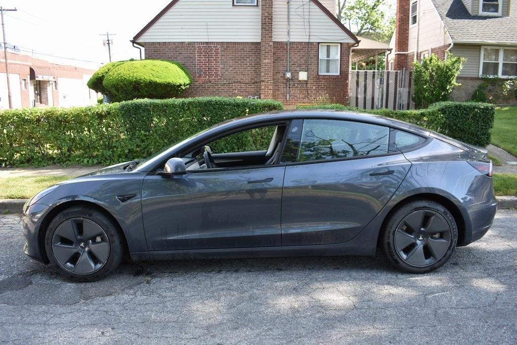 used 2023 Tesla Model 3 car, priced at $20,488