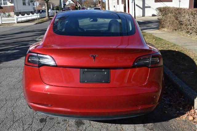 used 2023 Tesla Model 3 car, priced at $20,588