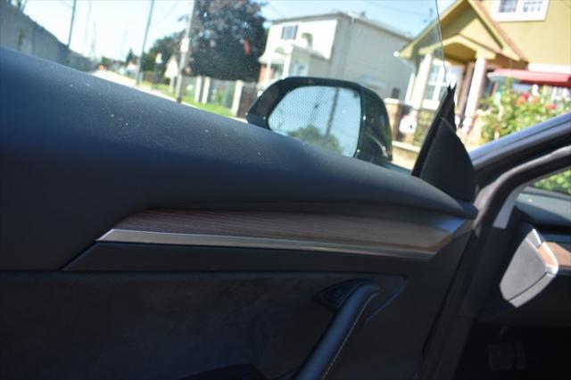used 2023 Tesla Model 3 car, priced at $22,488