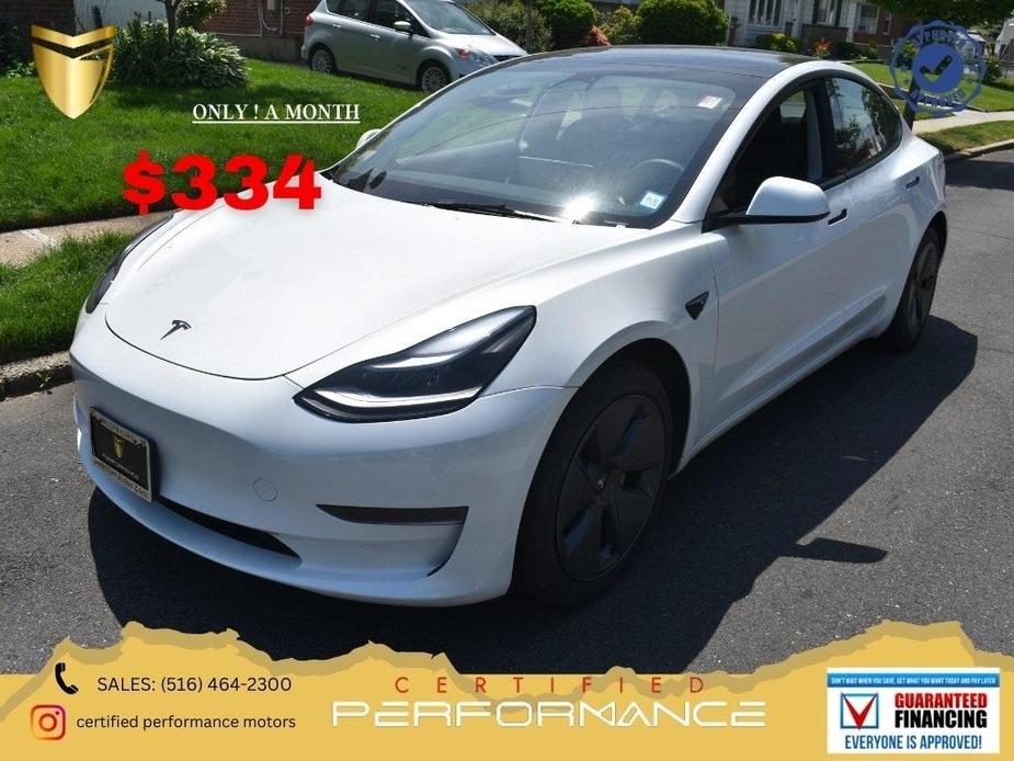 used 2023 Tesla Model 3 car, priced at $20,388
