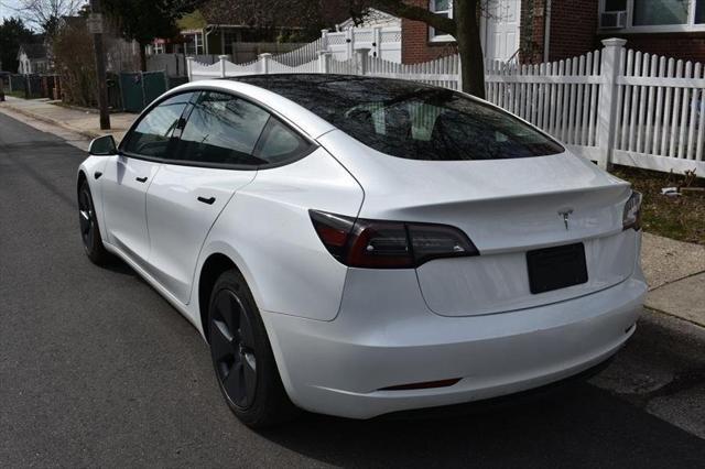 used 2023 Tesla Model 3 car, priced at $34,988