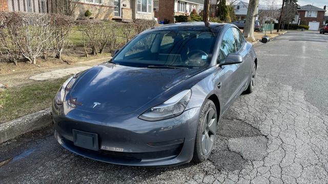 used 2023 Tesla Model 3 car, priced at $18,988