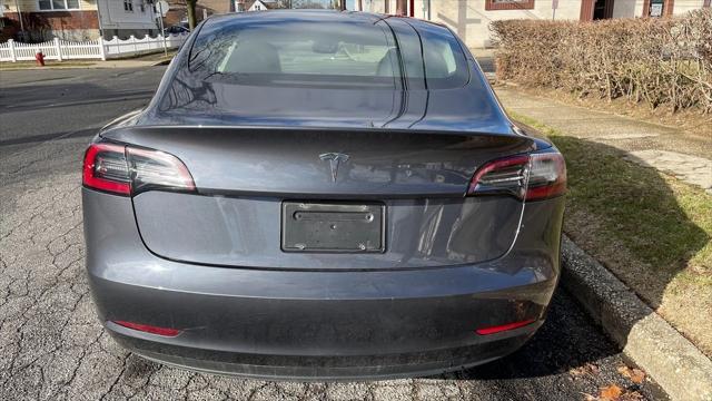 used 2023 Tesla Model 3 car, priced at $18,988