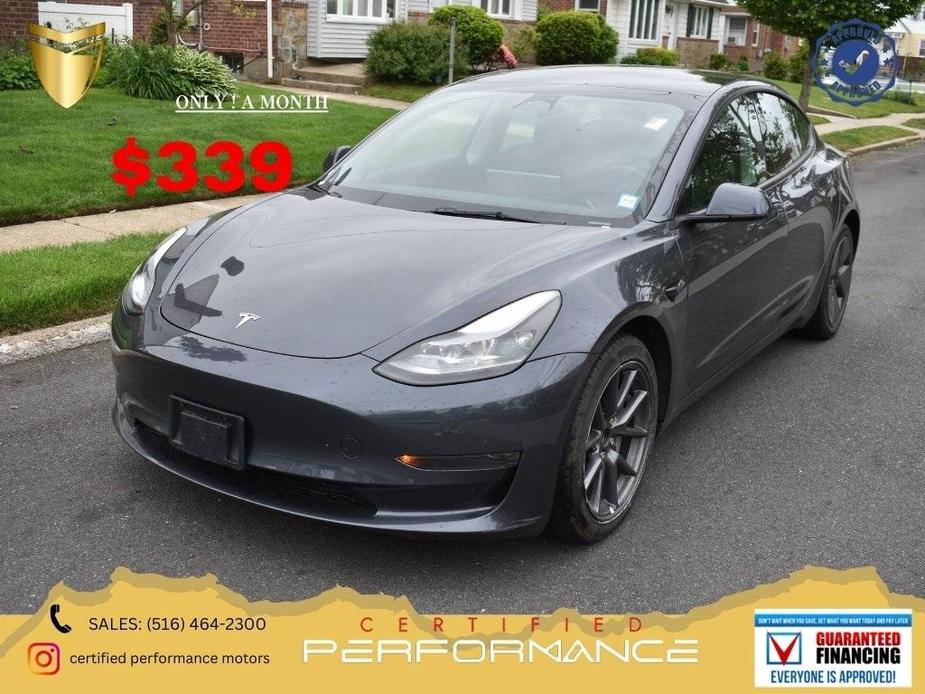 used 2023 Tesla Model 3 car, priced at $20,788