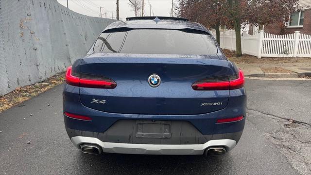 used 2022 BMW X4 car, priced at $28,486