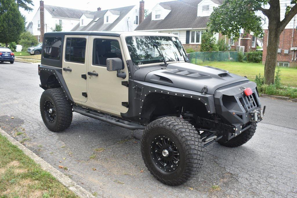 used 2018 Jeep Wrangler JK Unlimited car, priced at $17,488
