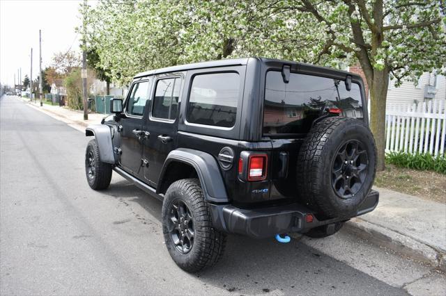 used 2023 Jeep Wrangler 4xe car, priced at $24,588