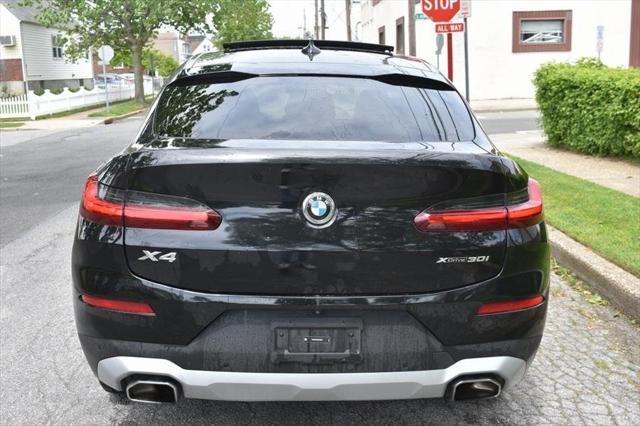 used 2023 BMW X4 car, priced at $29,988