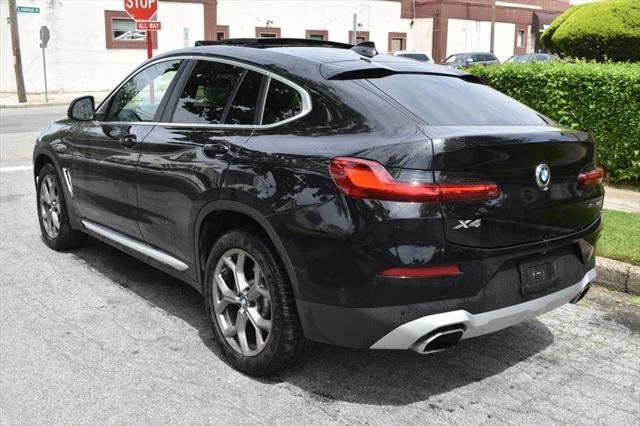 used 2023 BMW X4 car, priced at $29,988