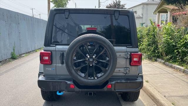 used 2023 Jeep Wrangler 4xe car, priced at $23,188