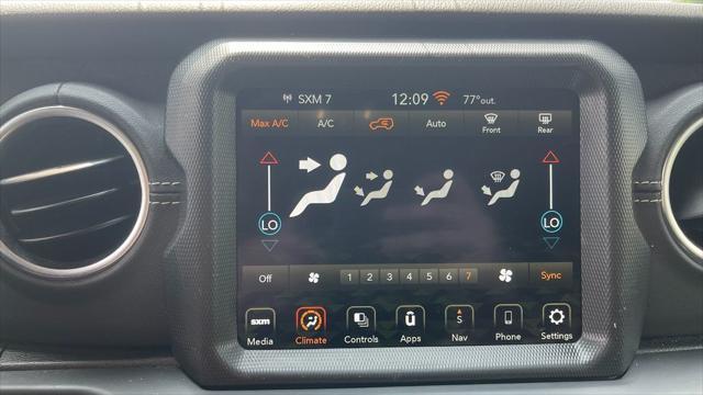 used 2023 Jeep Wrangler 4xe car, priced at $23,188