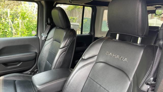 used 2023 Jeep Wrangler 4xe car, priced at $23,188