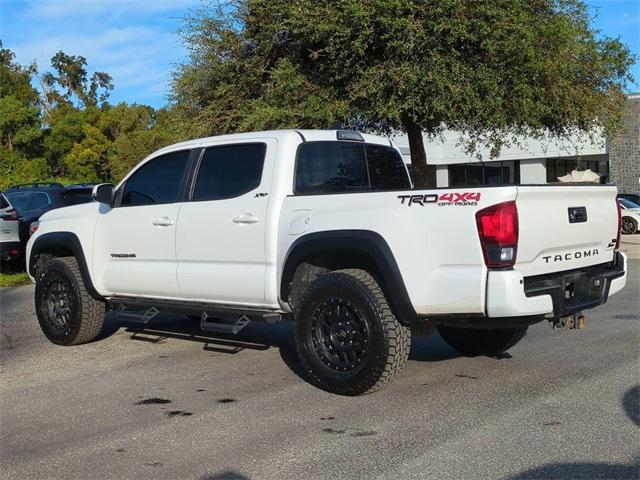 used 2019 Toyota Tacoma car, priced at $25,115