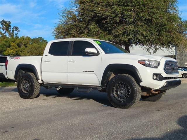 used 2019 Toyota Tacoma car, priced at $25,115