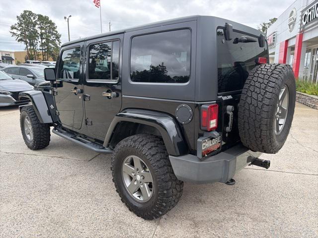 used 2013 Jeep Wrangler Unlimited car, priced at $16,499