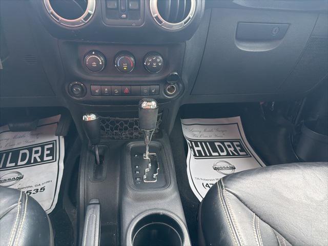 used 2013 Jeep Wrangler Unlimited car, priced at $16,499