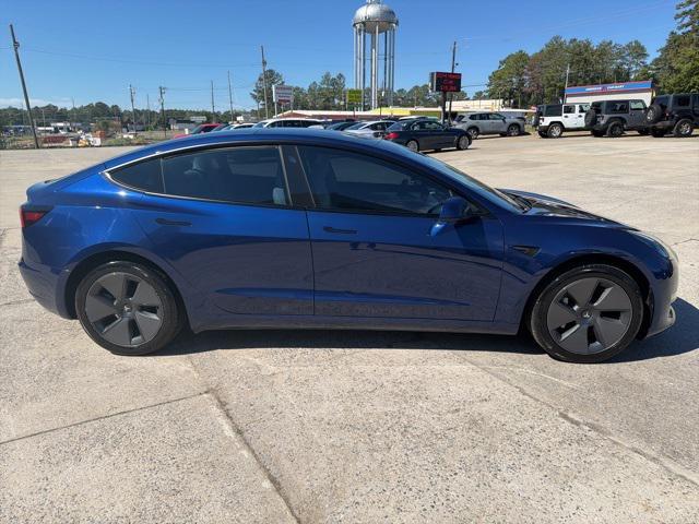 used 2023 Tesla Model 3 car, priced at $28,990