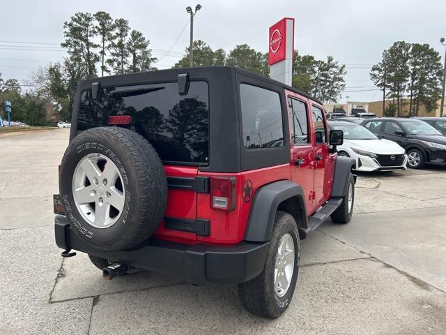 used 2011 Jeep Wrangler Unlimited car, priced at $15,994